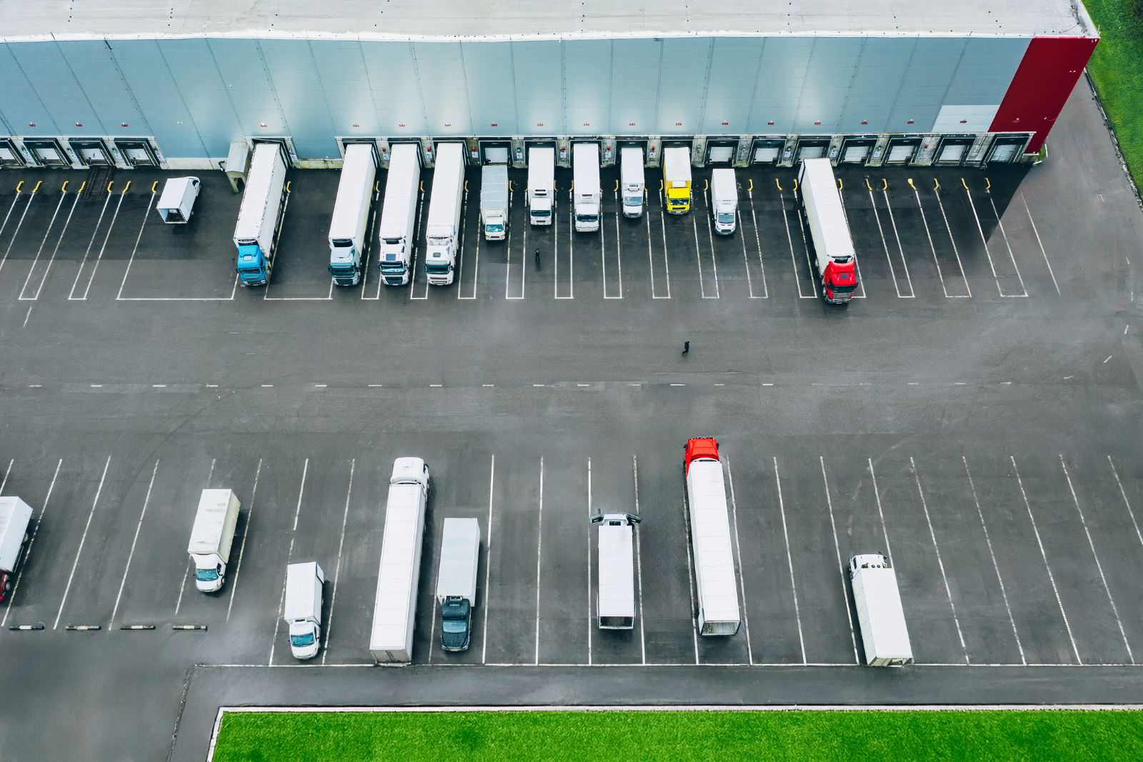 ariel view of semi truck docked at a warehouse