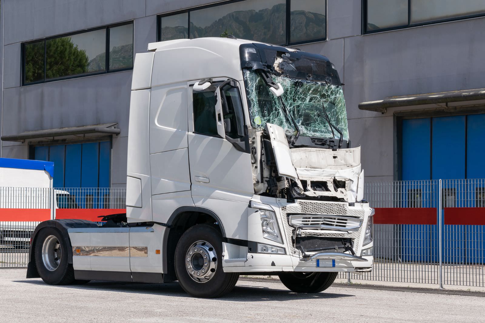 a semi-truck that has been hit from the front